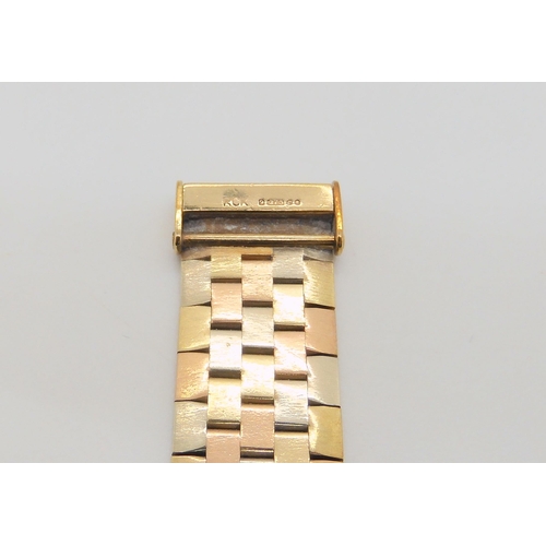 731 - A 9ct three colour gold bracelet, length 18cm, weight 29.1gms