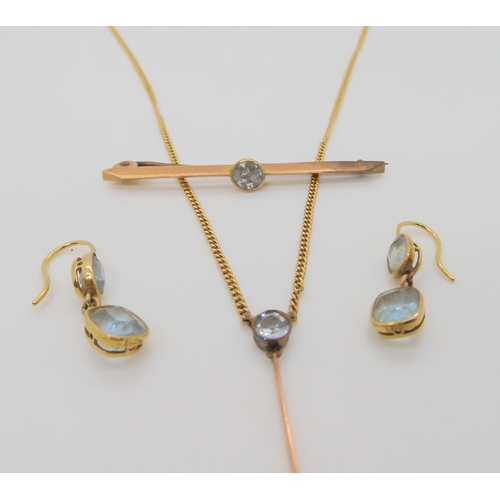 732 - A 15ct gold aquamarine pendant necklace, with matching earrings and a 9ct brooch. Chain length 44cm,... 