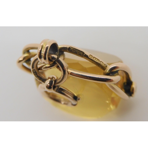 736 - A 9ct gold wide curb chain bracelet with heart shaped clasp, and a 9ct gold citrine fob seal. Width ... 