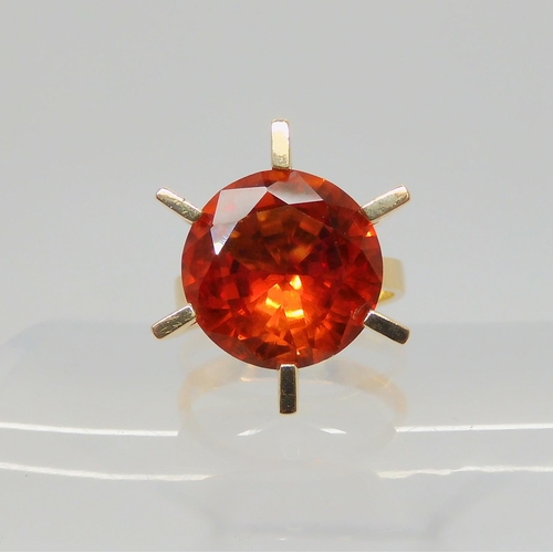 745 - A Danish 14ct gold retro ring by Ejner Bruno Christensen, set with an orange gem, finger size H1/2, ... 