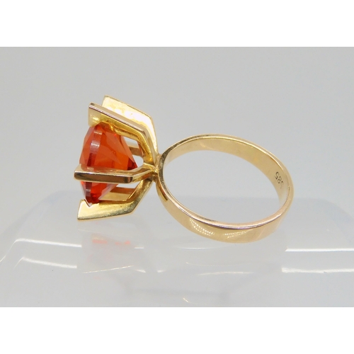 745 - A Danish 14ct gold retro ring by Ejner Bruno Christensen, set with an orange gem, finger size H1/2, ... 