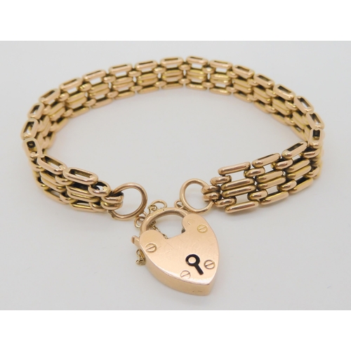 756 - A 9ct gold gate bracelet with a heart shaped clasp, length 19.5cm, weight 19gms