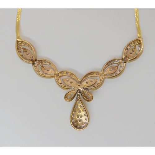 764 - A 9ct gold Italian made necklace, with the petal shaped links set with diamond melee, estimated appr... 