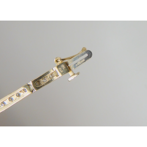 767 - A 9ct yellow gold diamond set bracelet, set with estimated approx 0.80cts of eight cut diamonds leng... 