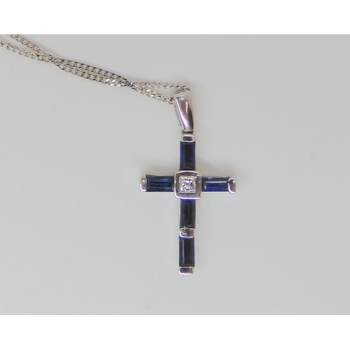 769 - An 18ct white gold sapphire and princess cut diamond cross pendant, length with bail 2.3cm, weight 1... 