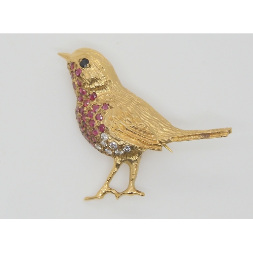 A 9ct gold ruby and diamond 'Robin' brooch, makers mark TAD, with Sheffield import marks. dimensions 3.2cm x 2.5cm, weight 4.6gms