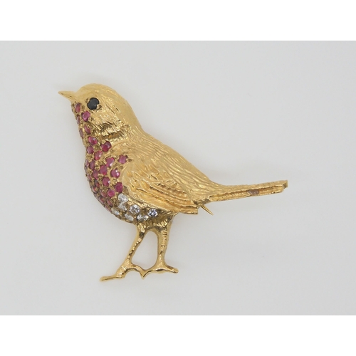 788 - A 9ct gold ruby and diamond 'Robin' brooch, makers mark TAD, with Sheffield import marks. dimensions... 