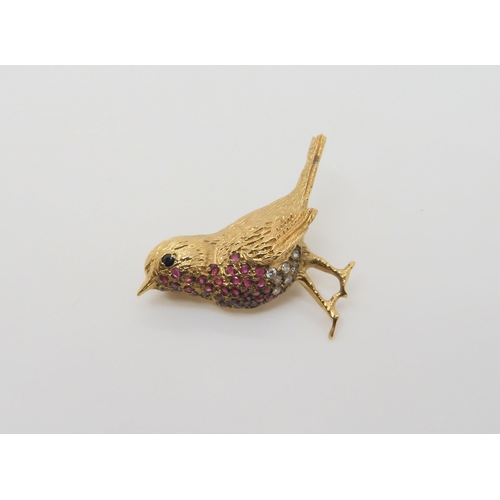 788 - A 9ct gold ruby and diamond 'Robin' brooch, makers mark TAD, with Sheffield import marks. dimensions... 