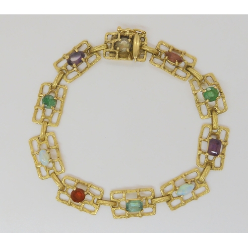 790 - An 18ct gold retro multi gem set bracelet, length 17.5cm, weight 13.2gms