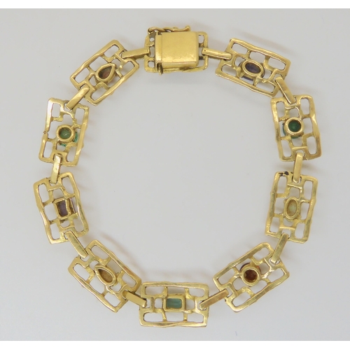 790 - An 18ct gold retro multi gem set bracelet, length 17.5cm, weight 13.2gms