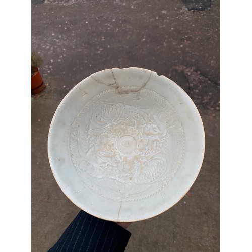 2392 - A CHINESE CELADON GLAZED BOWL Carved with foliage, 19.5cm diameter and a blue and white dragon bowl,... 