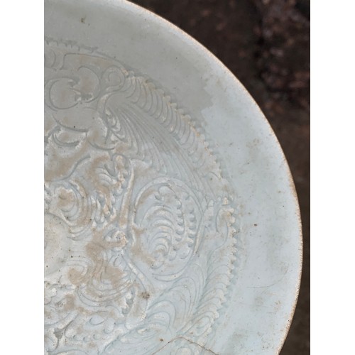 2392 - A CHINESE CELADON GLAZED BOWL Carved with foliage, 19.5cm diameter and a blue and white dragon bowl,... 