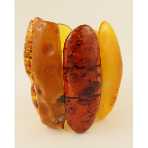 101 - Item 6. A very large yellow and orange amber coloured statement bracelet