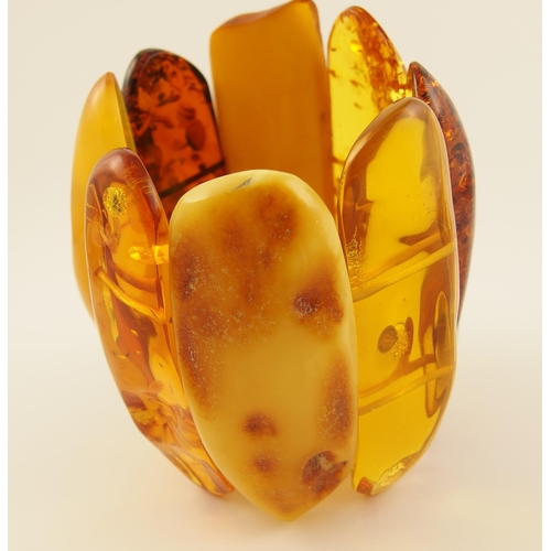 101 - Item 6. A very large yellow and orange amber coloured statement bracelet