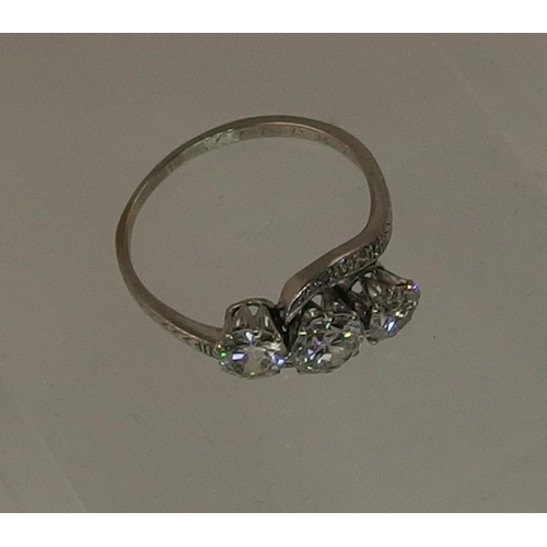 118 - An old cut three stone diamond ring