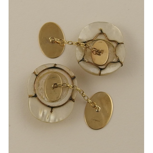 133 - A pair of jockey's cap cufflinks