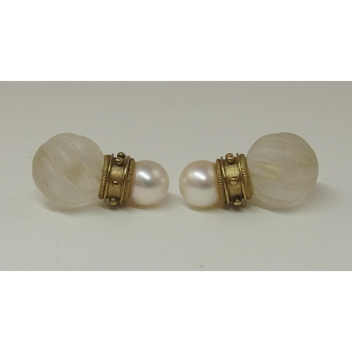 138 - A pair of earrings attributed to