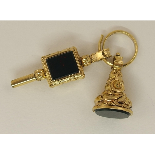 154 - A yellow metal watch key