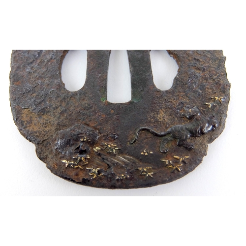 238 - A Japanese cast iron Tsuba