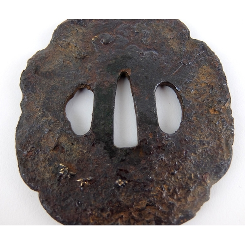 238 - A Japanese cast iron Tsuba