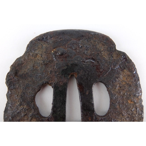 238 - A Japanese cast iron Tsuba