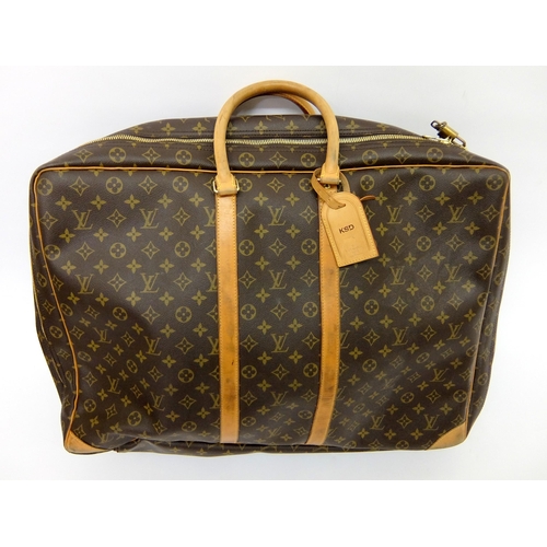 284 - Louis Vuitton  four travel cases