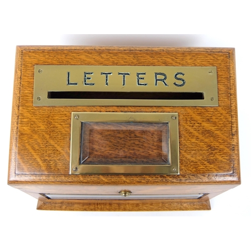 302 - An Edwardian oak letter box