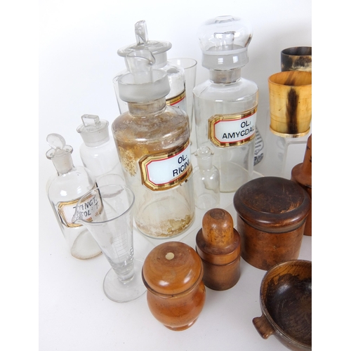 311 - A group of treen medicine bottle containers