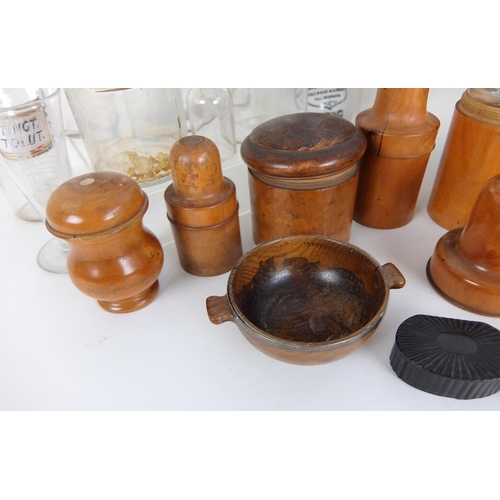 311 - A group of treen medicine bottle containers