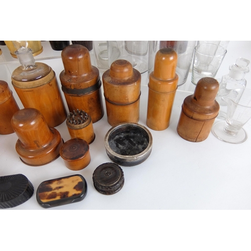 311 - A group of treen medicine bottle containers