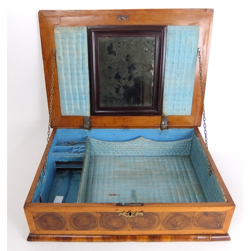 315 - A walnut oyster veneered rectangular dressing table box in the 17th Century style