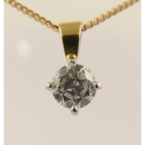 63 - An 18ct solitaire diamond pendant