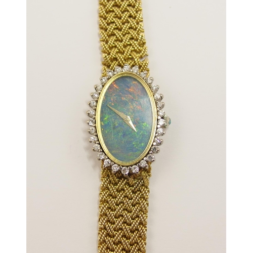 64 - An 18ct opal faced ladies Chopard watch