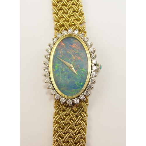 64 - An 18ct opal faced ladies Chopard watch