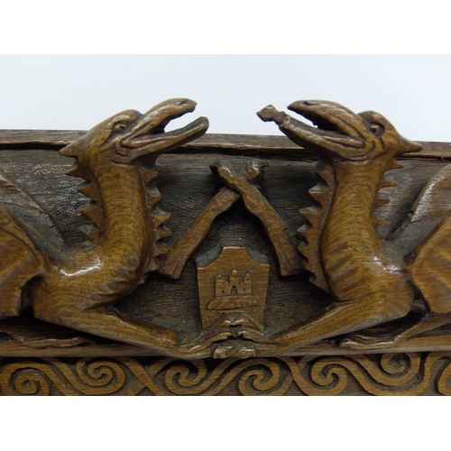 702 - Manner of ALEXANDER RITCHIE an elaborately carved oak picture frame