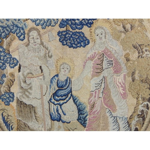 703 - An 18th Century silk and woolwork panel of The Holy Family