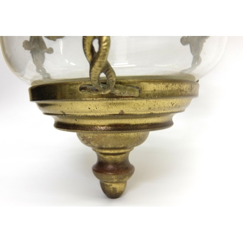 704 - A brass and glass hall lantern