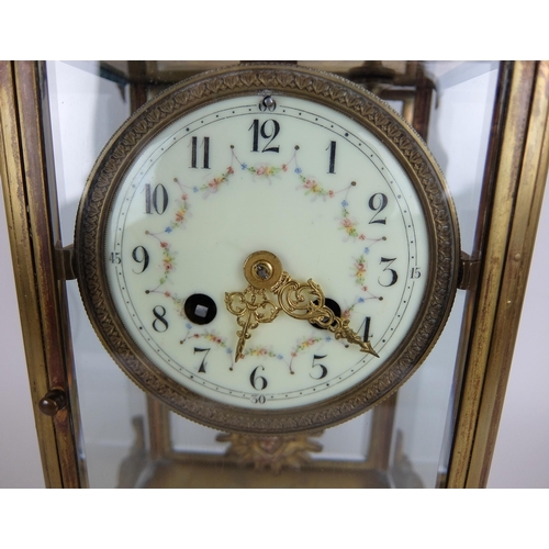 710 - A French Rococo style gilt metal mounted mantle clock