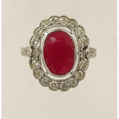 79 - A 14ct diamond and ruby ring