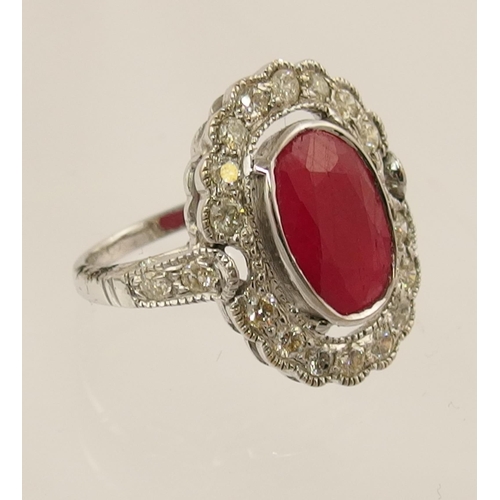 79 - A 14ct diamond and ruby ring