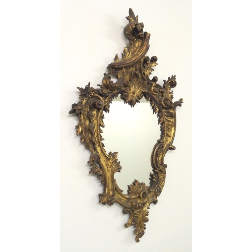 846 - An ornate giltwood wall mirror