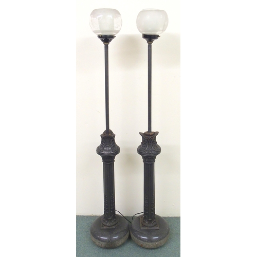 870 - A pair of Victorian converted cast iron and granite floor lamps