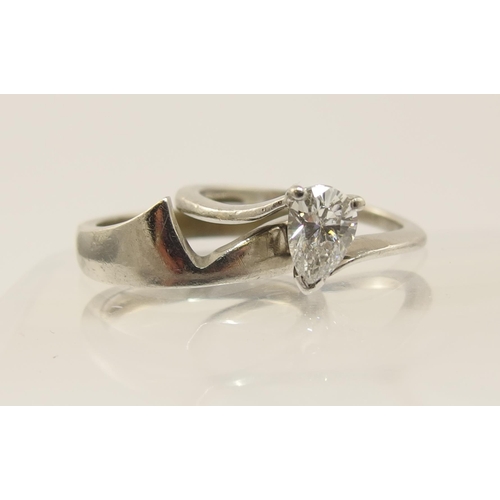 95 - A pear shaped diamond ring