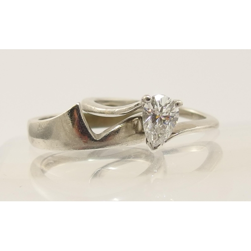 95 - A pear shaped diamond ring