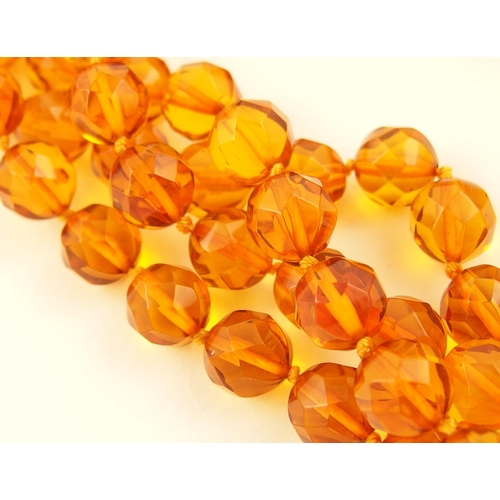 98 - Item 3. A diamond orange and cherry amber colour necklace