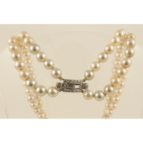 113 - A double strand of pearls