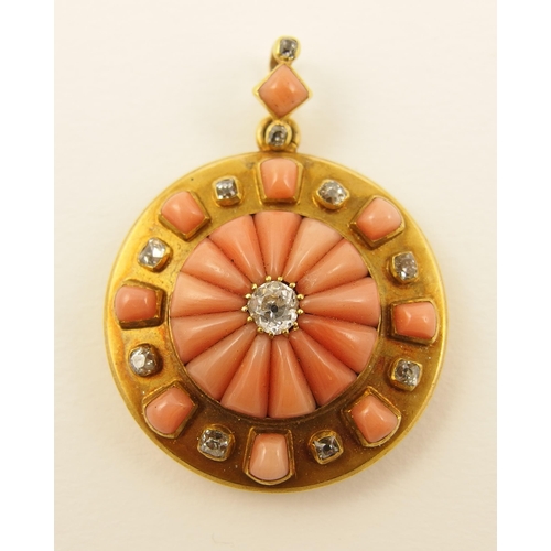 128 - A Victorian carved coral and diamond pendant