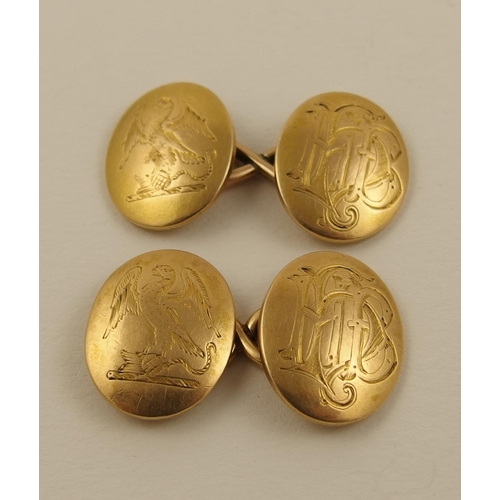 133 - A pair of yellow metal heraldic cufflinks