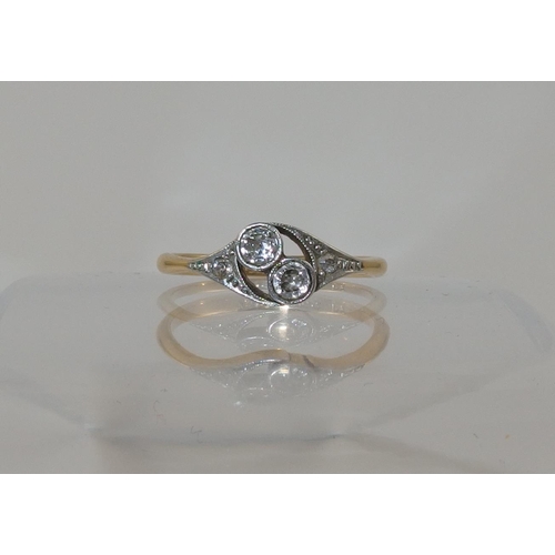 140B - An Edwardian twin stone diamond ring