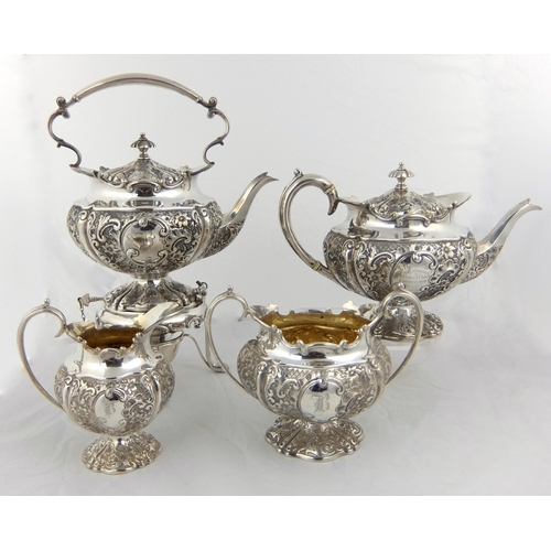 144 - A three piece silver tea service